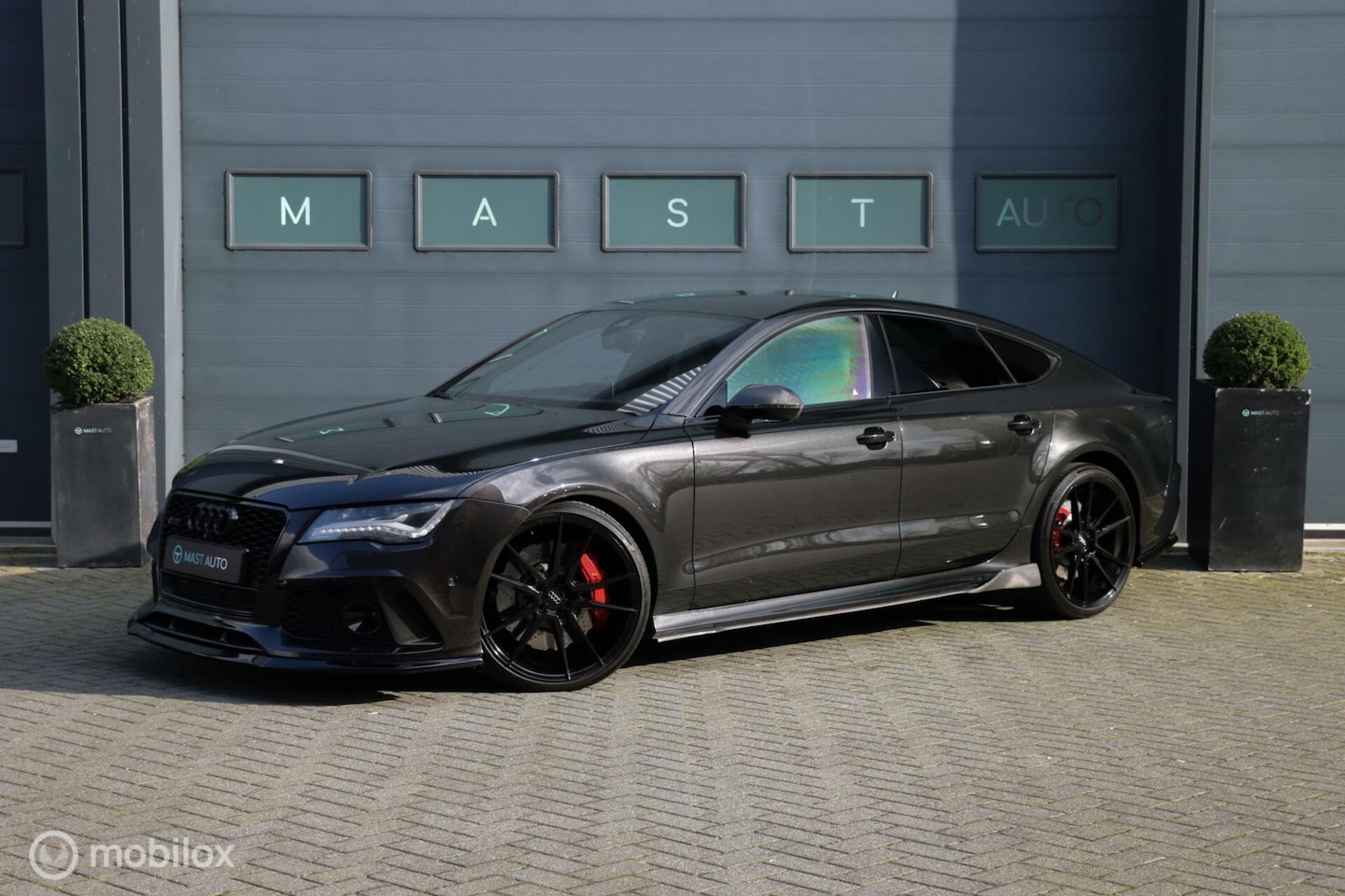 Audi RS7 - 4.0 TFSI quattro|Panterzwart|Carbon|ACC|4x Verwarm| - AutoWereld.nl