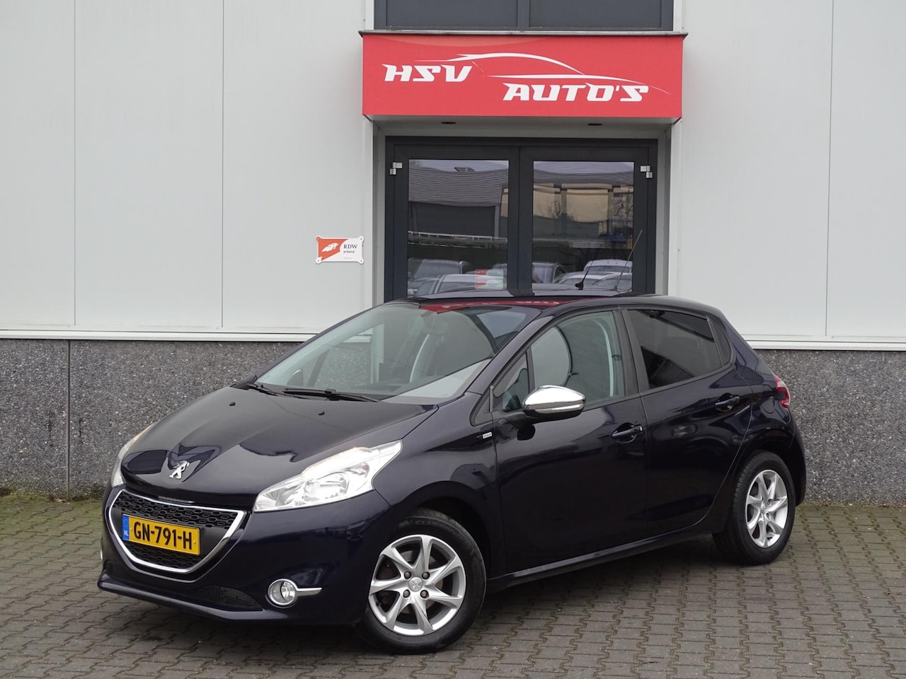 Peugeot 208 - 1.2 PureTech Style airco navi LM 4-deurs - AutoWereld.nl