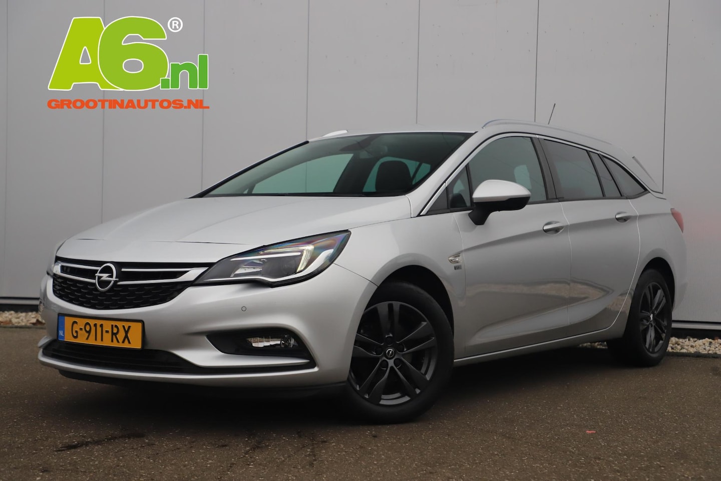 Opel Astra Sports Tourer - 1.0 Turbo 120 Jaar Edition 16 inch Navigatie Carplay Android Clima Cruise Parkeersensor Ge - AutoWereld.nl