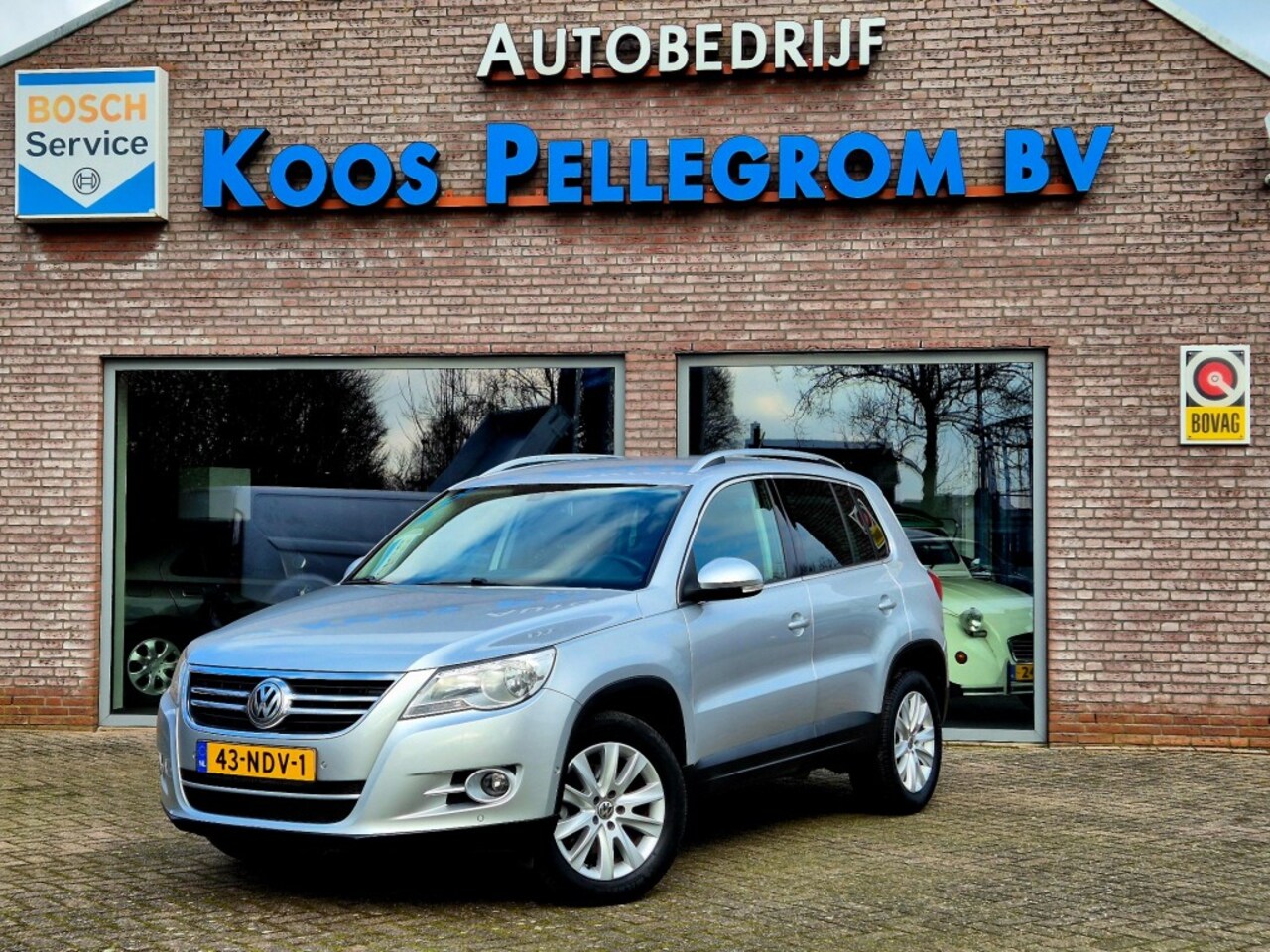 Volkswagen Tiguan - 1.4 TSI SPORTenSTYLE/Bovag garantie - AutoWereld.nl