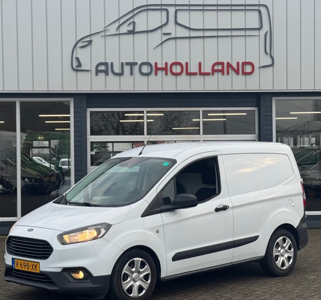 Ford Transit Courier - 1.5 TDCI 55KW 75PK EURO 6 AIRCONAVIGATIE/ CRUISE CONTROL/ SCHUIF - AutoWereld.nl