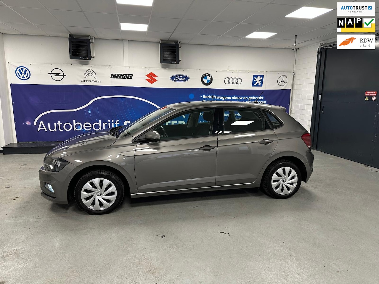 Volkswagen Polo - 1.0 TSI Business CARPLAY/NAV/CRUIS/ - AutoWereld.nl