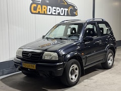 Suzuki Grand Vitara - 2.0 Metal Top