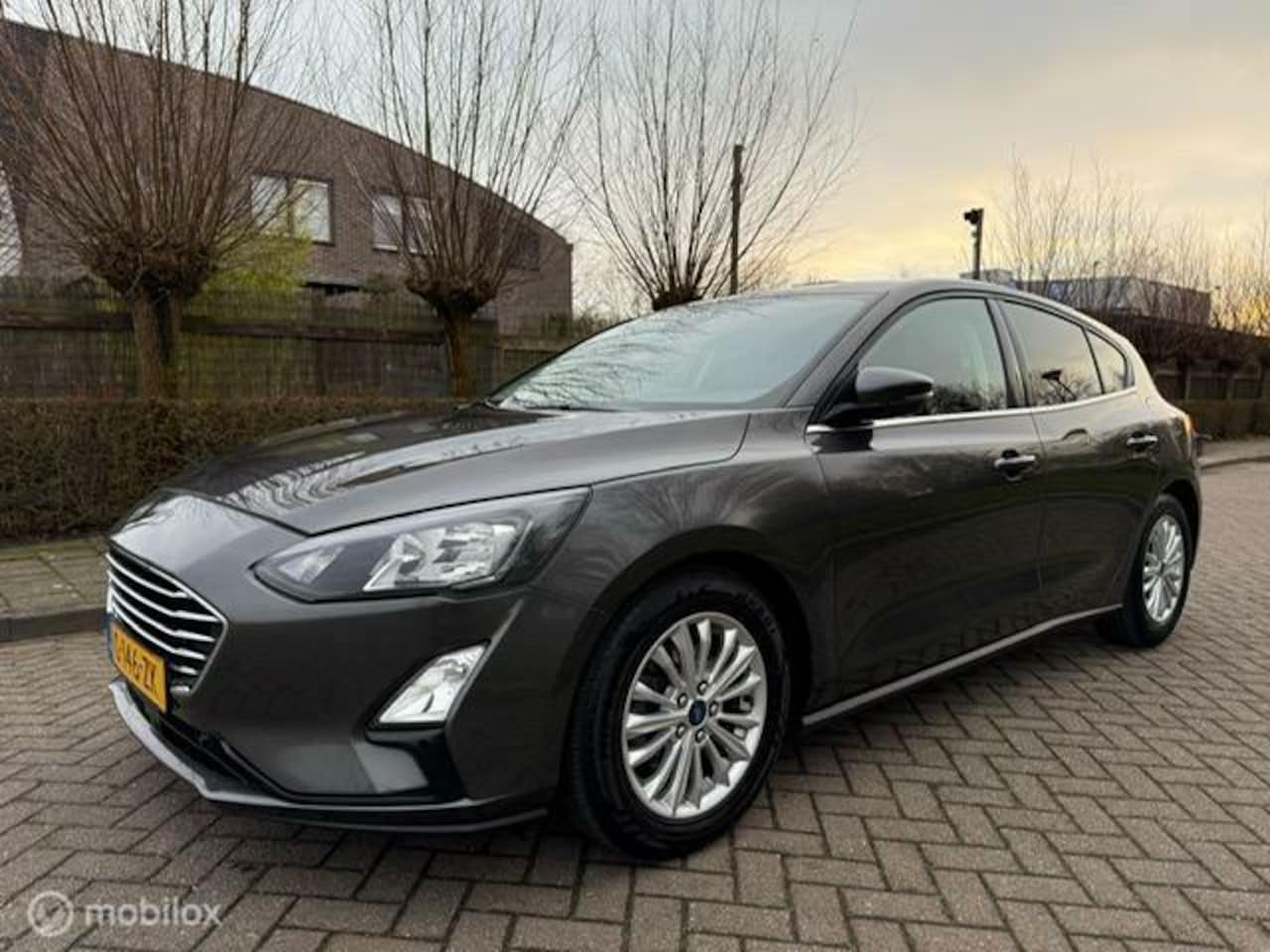 Ford Focus - 1.0 EcoBoost Titanium Business 1.0 EcoBoost Titanium Business - AutoWereld.nl