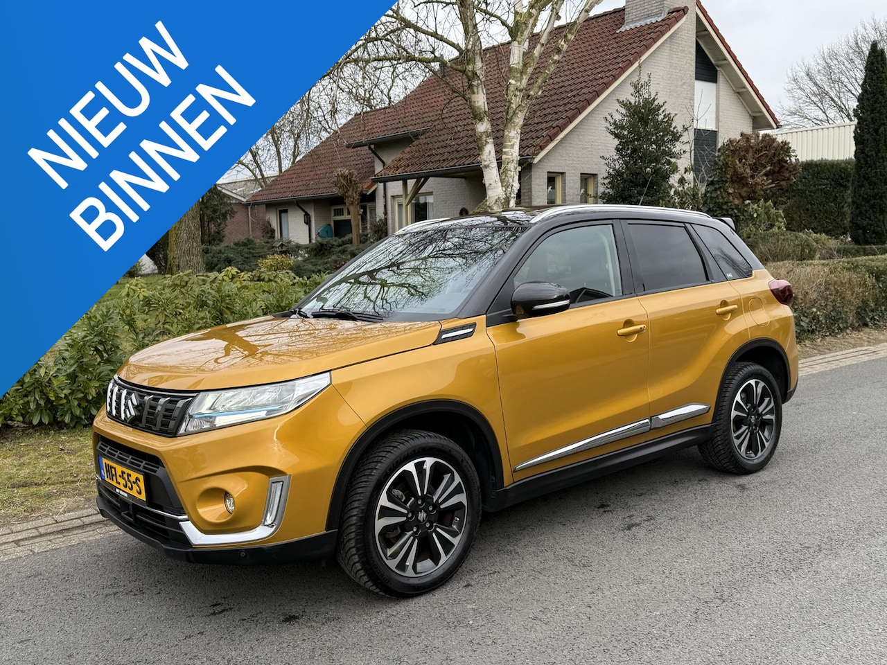 Suzuki Vitara - 1.5 Hybrid Style Automaat•Leder•Pano - AutoWereld.nl