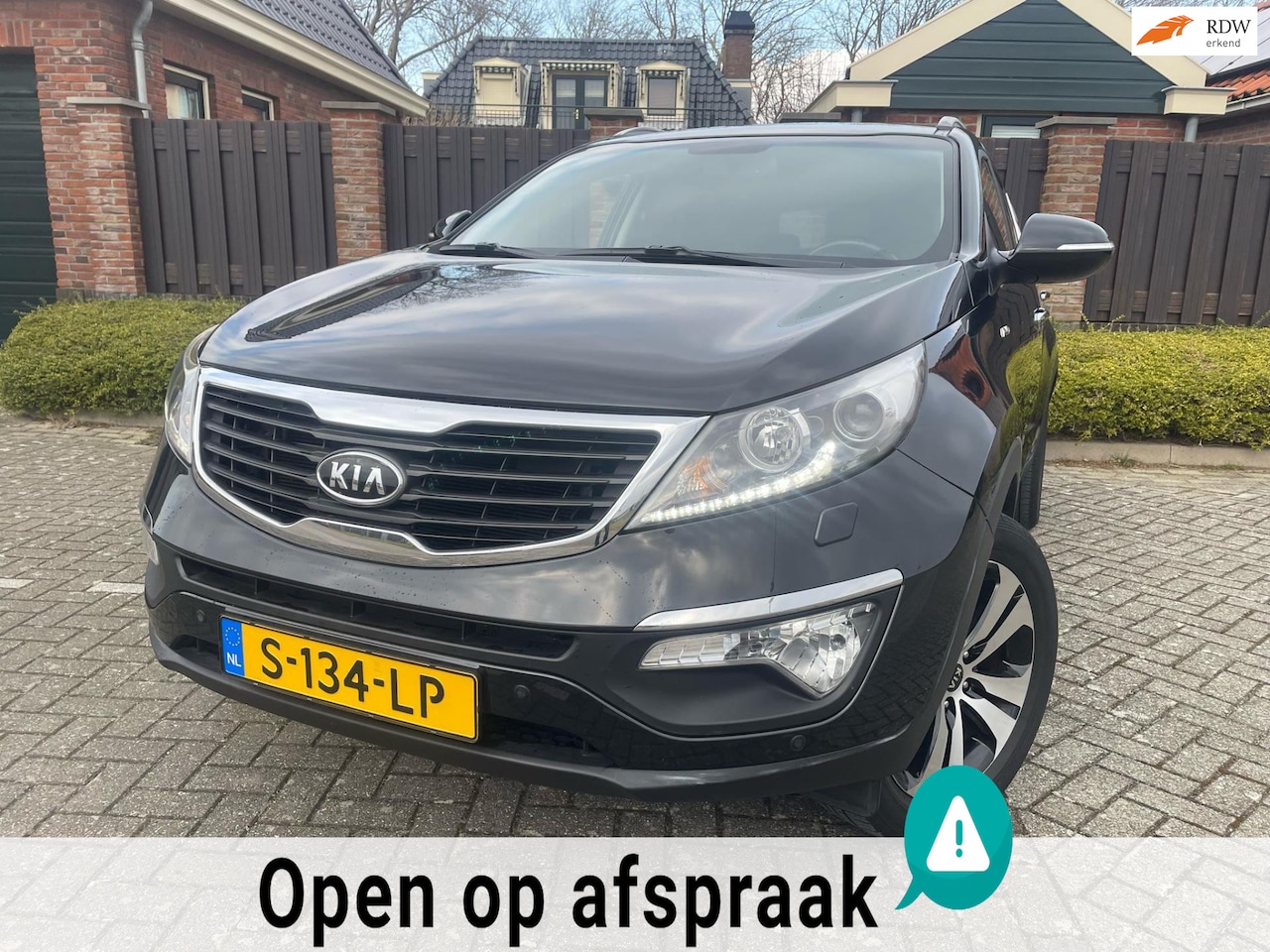 Kia Sportage - 2.0 X-clusive 4wd AUTOMAAT NAVI TREKHAAK CLIMA - AutoWereld.nl