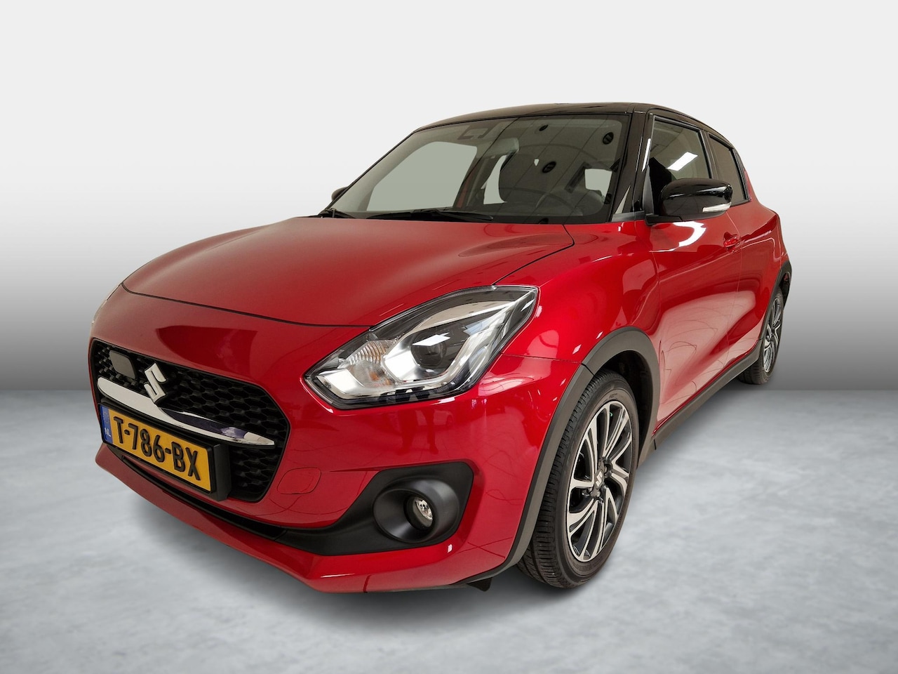 Suzuki Swift - 1.2 Style Smart Hybrid Automaat | Uniek gestyled - AutoWereld.nl