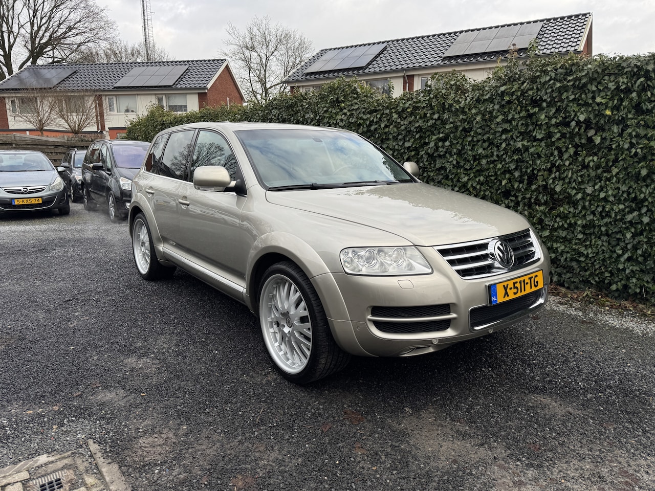 Volkswagen Touareg - 4.2 V8 Highline CARACTERE Automaat | Leer | Navi | Xenon | Luchtvering | 22" LMV | Autom. - AutoWereld.nl