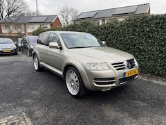 Volkswagen Touareg - 4.2 V8 Highline CARACTERE Automaat | Leer | Navi | Xenon | Luchtvering | 22" LMV | Autom.