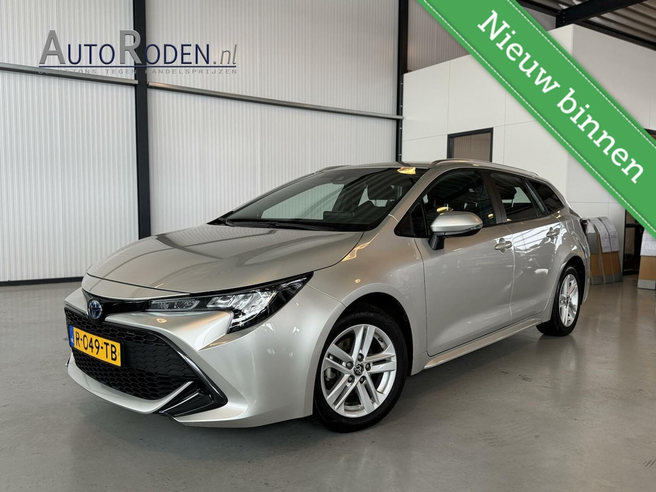 Toyota Corolla Touring Sports - 1.8 Hybrid 90kw Active Touring Sports|Camera|CarPlay|Adapt.Cruise| - AutoWereld.nl