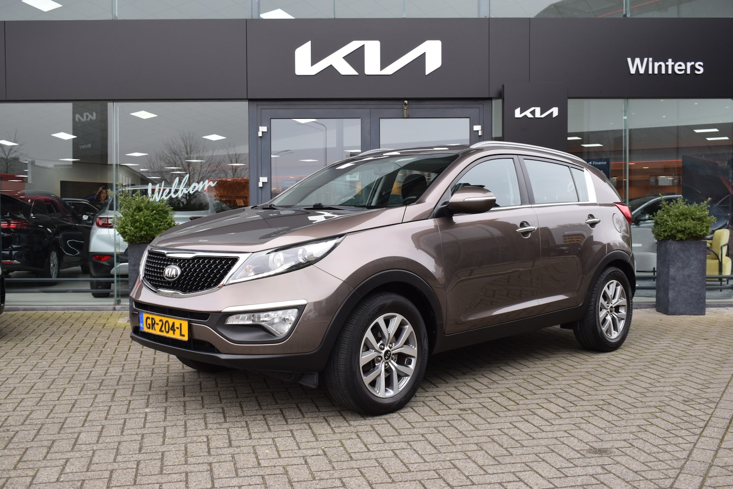 Kia Sportage - 2.0i-16V BusinessLine ECC Cr.Control Navi+Camera BT+USB 6-bak LED 17"LMV Trekhaak PDC Deal - AutoWereld.nl