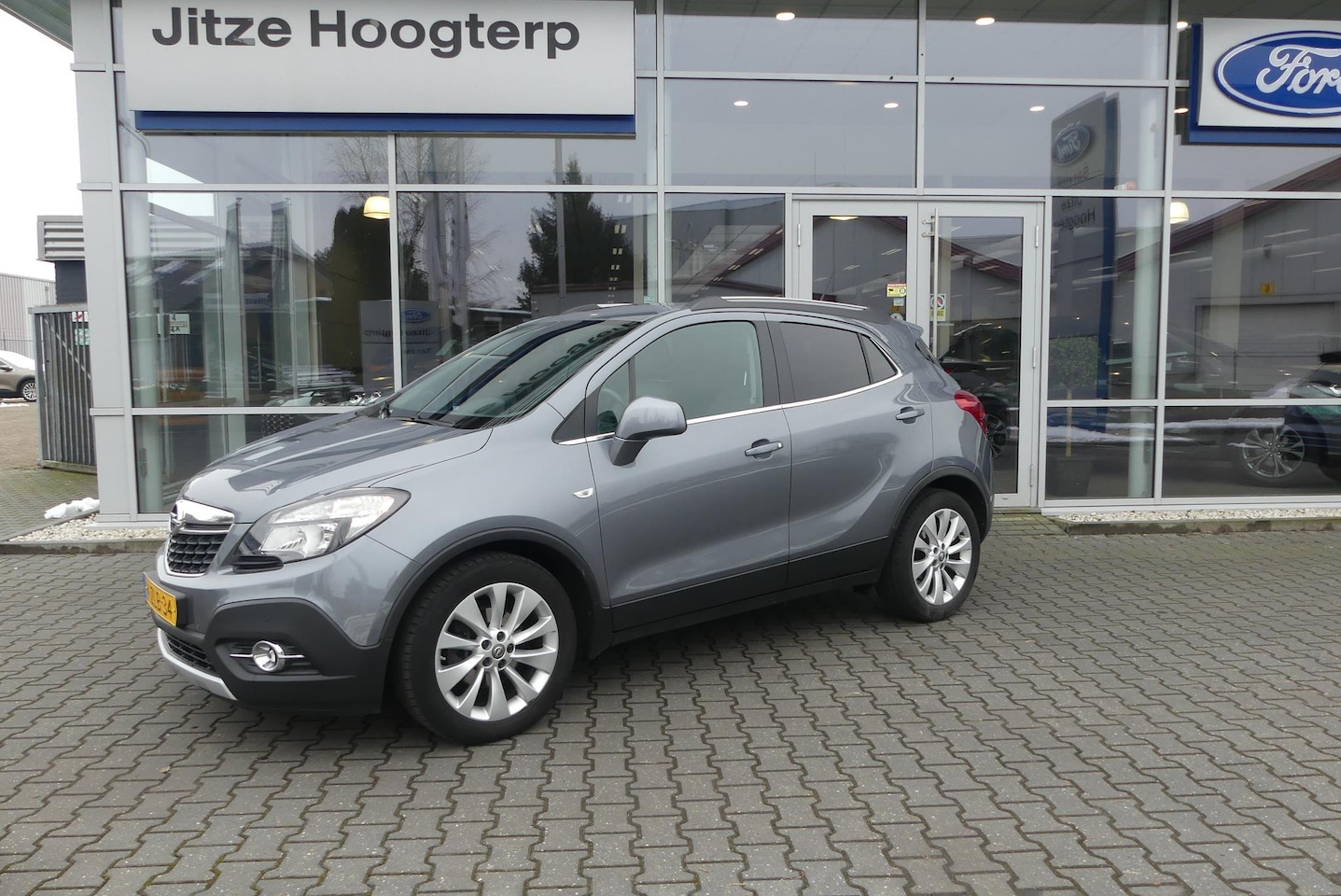 Opel Mokka - 1.4 TURBO Cosmo NAVI.LEER.SCHUIFDAK.TREKHAAK.WINTERPAKKET.82541KM. - AutoWereld.nl