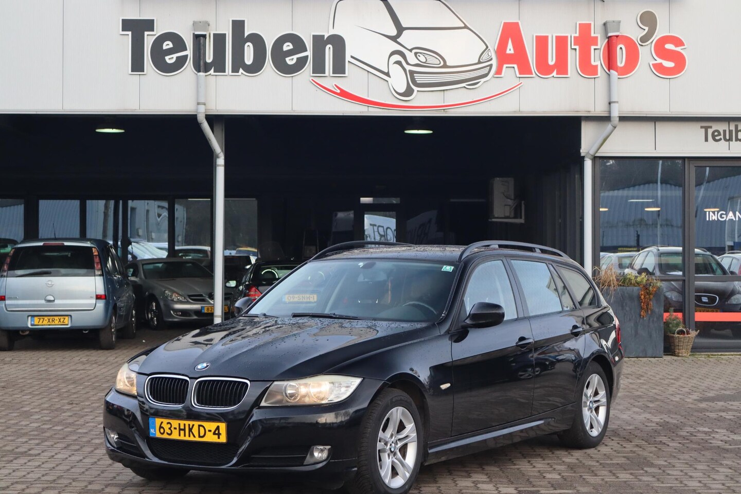 BMW 3-serie Touring - 318i Business Line Navigatie, Cruise control, Climate control, Lichtmetalen wielen - AutoWereld.nl