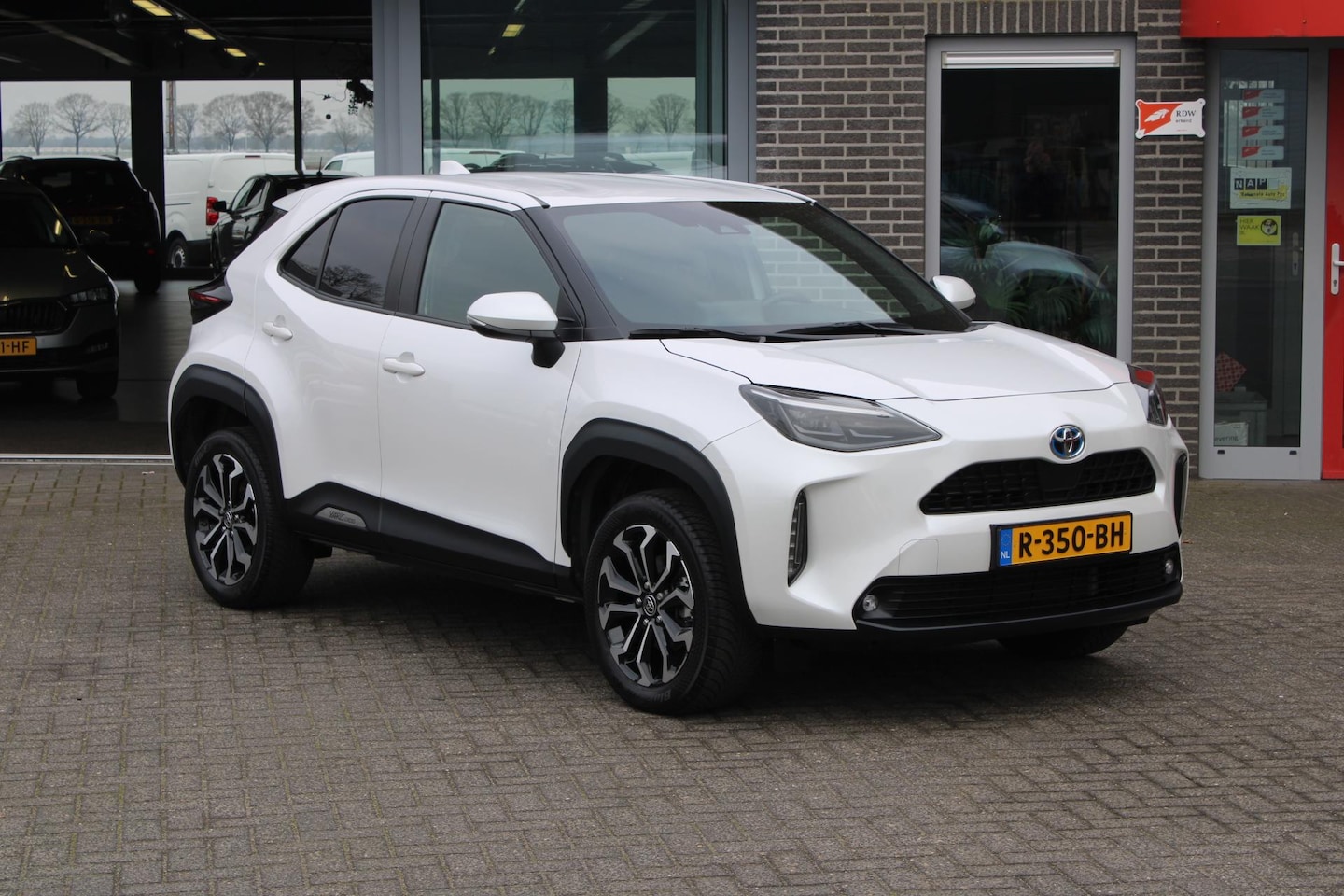 Toyota Yaris Cross - 1.5 Hybrid First Edition Led/Navi/Adaptive/N.A.P. - AutoWereld.nl