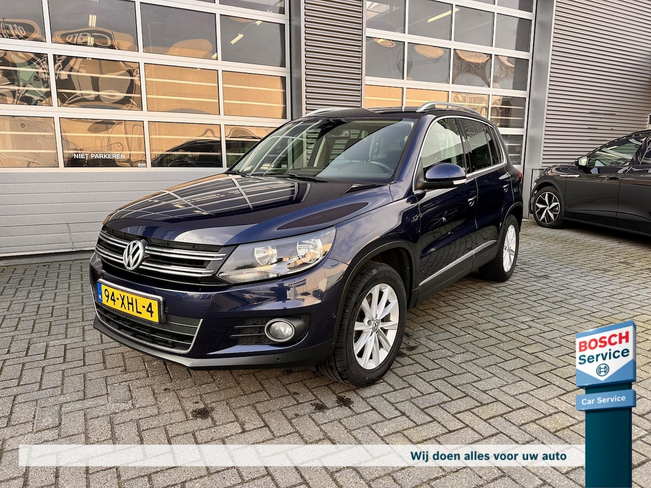 Volkswagen Tiguan - 1.4 TSI 160pk Sport & Style 1800 kg trekgewicht ! - AutoWereld.nl