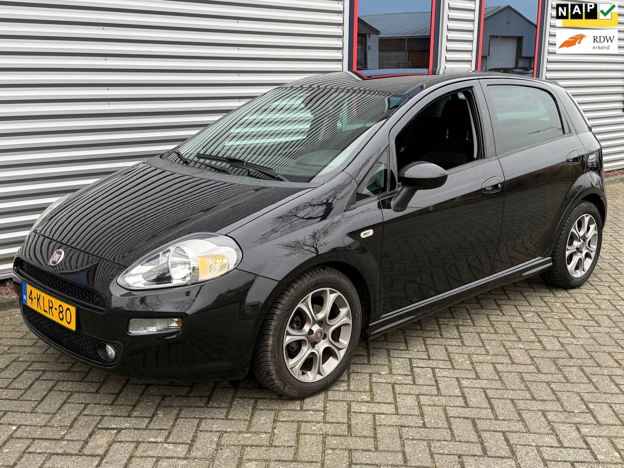 Fiat Punto Evo - 1.3 M-Jet Lounge Clima - AutoWereld.nl