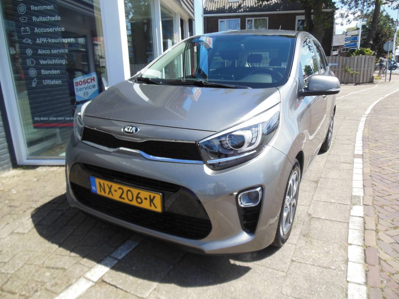 Kia Picanto - 1.0 CVVT First Edition 12 maanden Bovag garantie navi/carplay/android - AutoWereld.nl