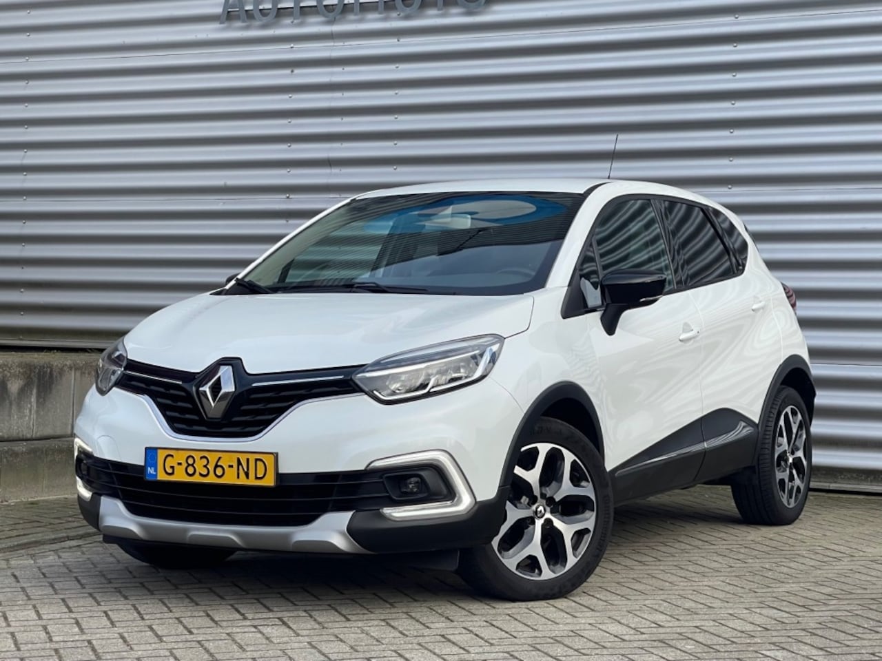 Renault Captur - 1.3 TCE Intens Airco Navi Parksensor DAB - AutoWereld.nl