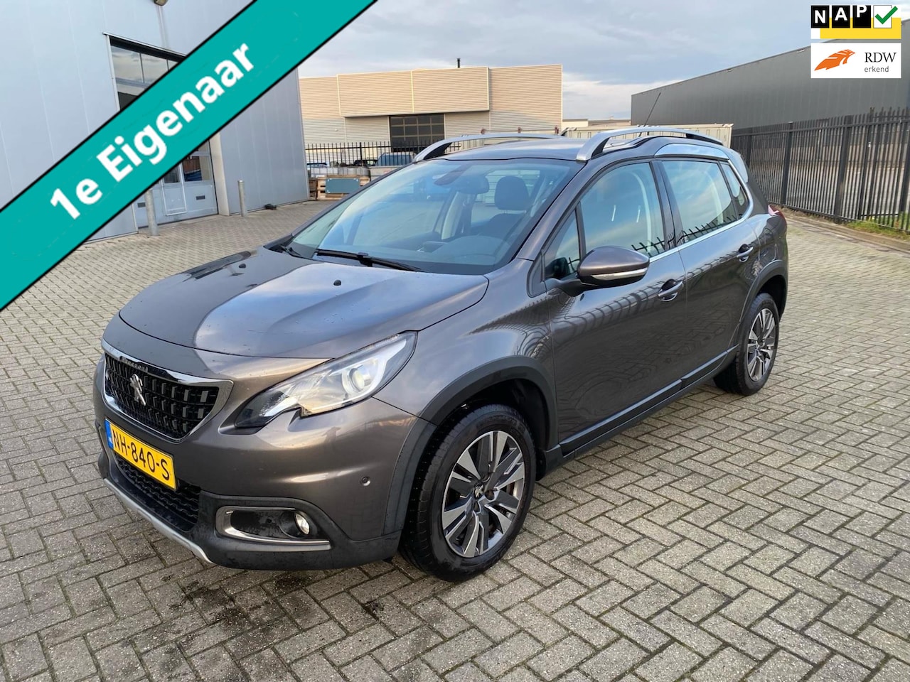 Peugeot 2008 - 1.2 PureTech Allure Clima Navi Panorama Trekhaak 1250kg. - AutoWereld.nl