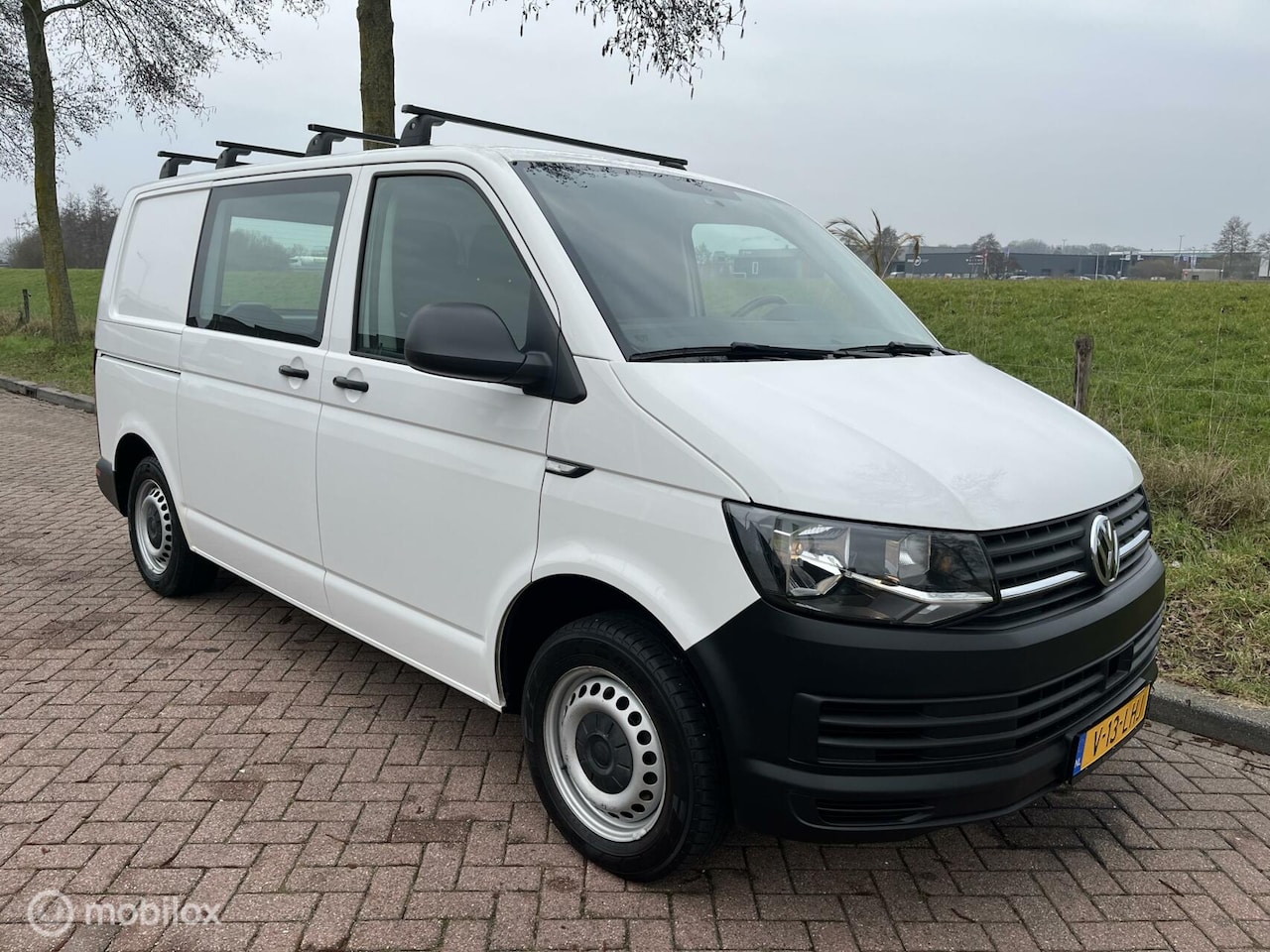 Volkswagen Transporter - 2.0 TSI Benzine + 2x Schuifdeur - AutoWereld.nl