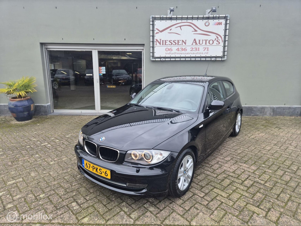 BMW 1-serie - E81 118i Ultimate Edition Navi/Xenon/Nwe Ketting - AutoWereld.nl