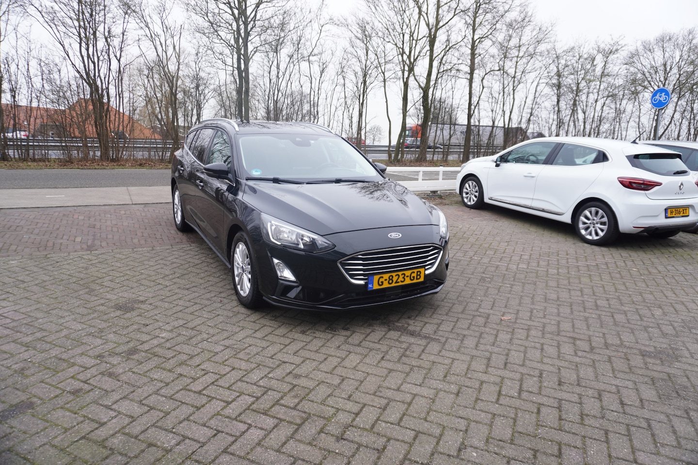 Ford Focus Wagon - 1.0 EcoBoost Titanium Business B&O SOUND TREKHAAK STOEL- EN STUURVERWARMING - AutoWereld.nl