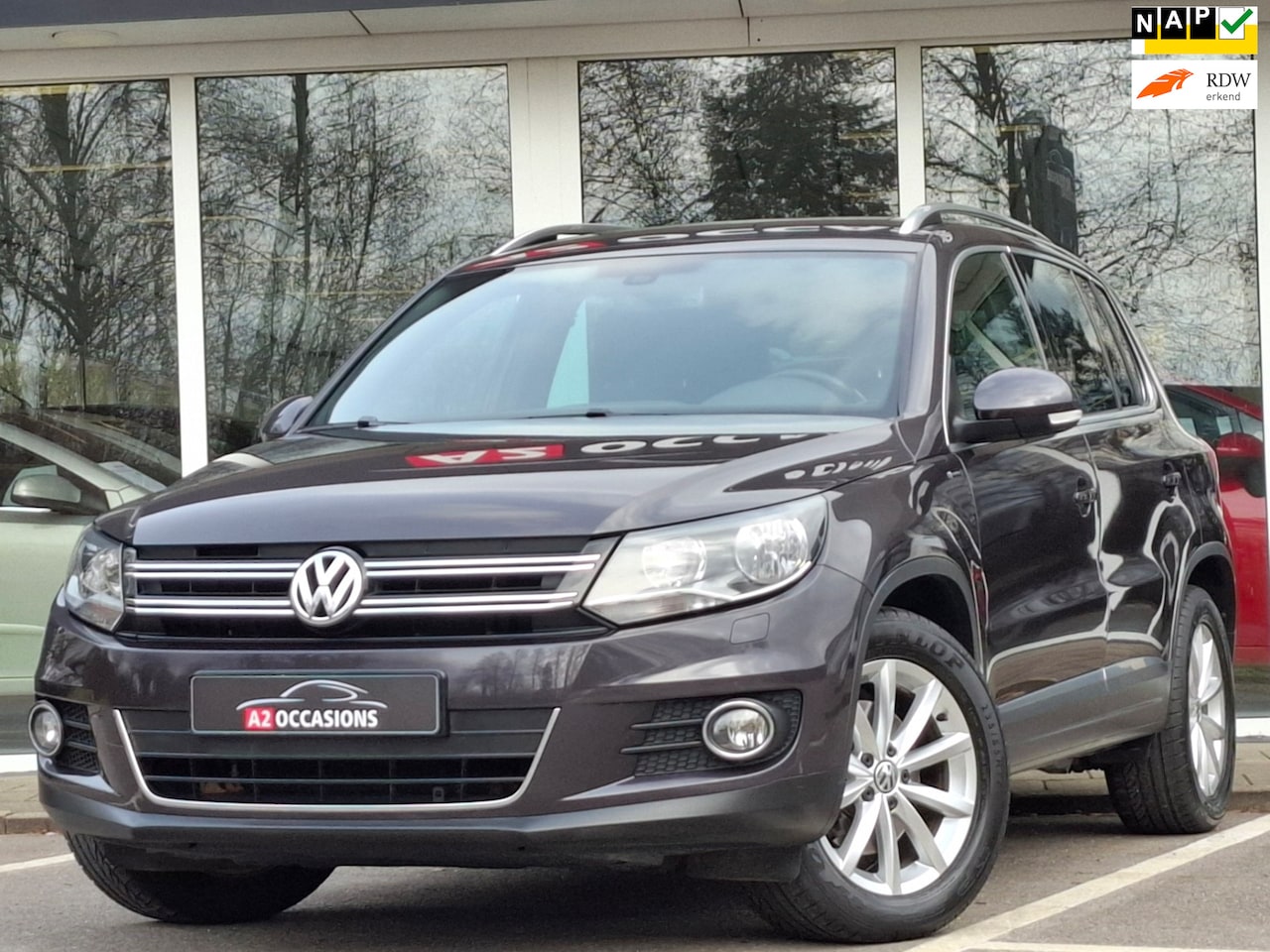 Volkswagen Tiguan - 1.4 TSI Sport&Style Trekhaak/Cruise/Navi/Bluetooth/Camera - AutoWereld.nl