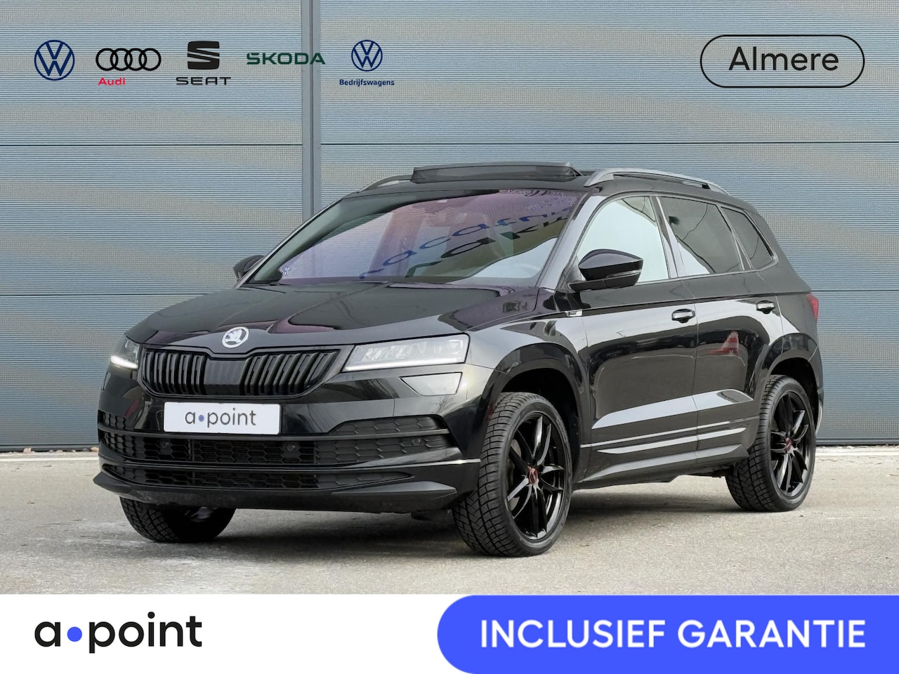 Skoda Karoq - 1.5 TSI ACT Sportline Business 150pk | Panoramadak | Navigatie | Parkeersensoren voor en a - AutoWereld.nl