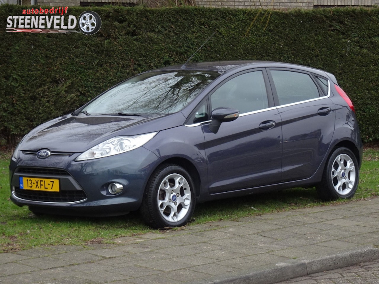 Ford Fiesta - 1.25 Titanium met Airco en Trekhaak - AutoWereld.nl