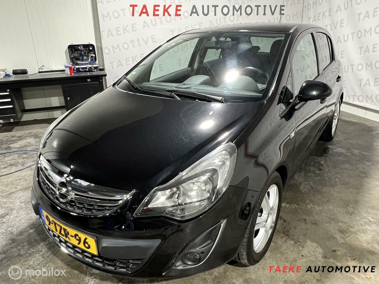 Opel Corsa - 1.4-16V Clima/Cruise/Navi/NAP/Parkeersen - AutoWereld.nl