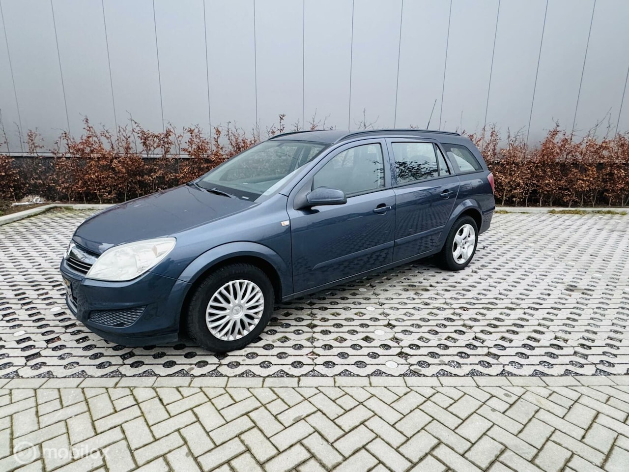 Opel Astra Wagon - 1.6 Temptation airco cruise - AutoWereld.nl