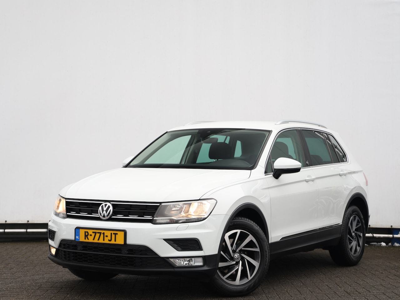 Volkswagen Tiguan - 1.4 TSI Comfortline 125PK I Navigatie I Stoelverwarming | Cruise control I Parkeersensoren - AutoWereld.nl