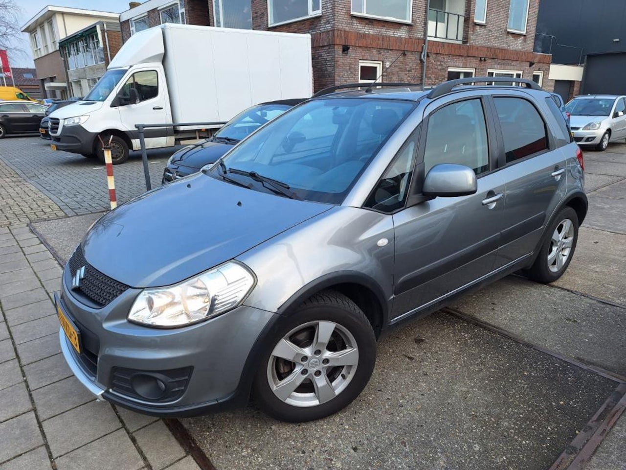 Suzuki SX4 - 1.6 Exclusive| Park sens| navi|Trekhaak|NAP! - AutoWereld.nl