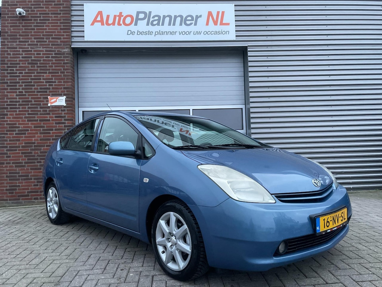 Toyota Prius - 1.5 VVT-i! Airco! Cruise! Navi! LM Velgen! - AutoWereld.nl