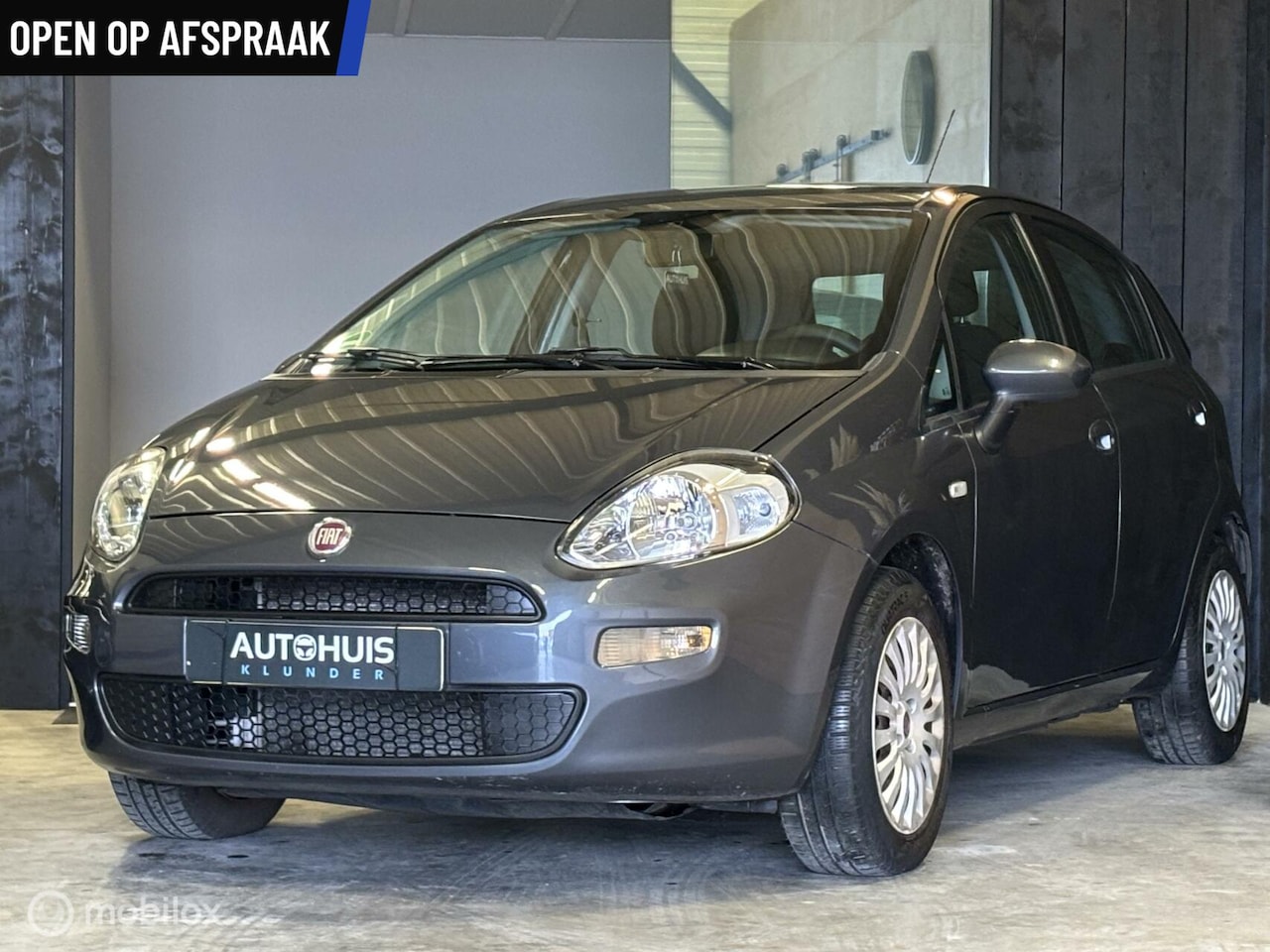 Fiat Punto Evo - 1.2 8v * NW APK * Airco * - AutoWereld.nl