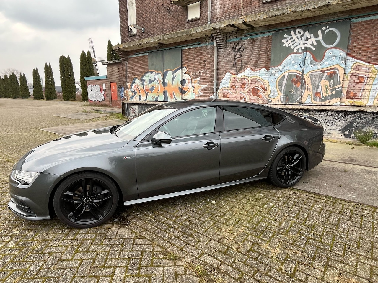 Audi A7 Sportback - 1.8 TFSI S line edition - AutoWereld.nl