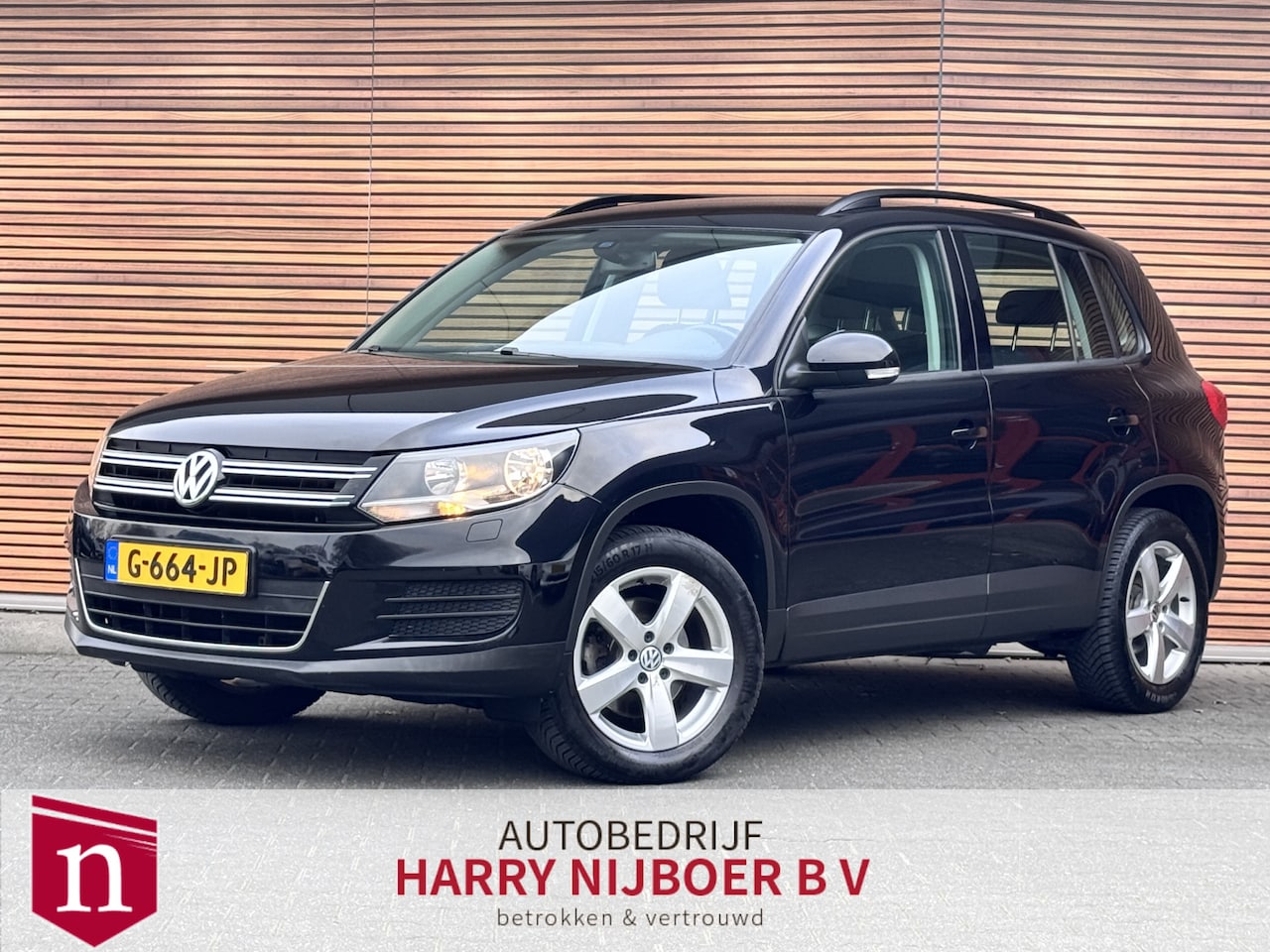 Volkswagen Tiguan - 1.4 TSI Easyline Trekhaak / Navi / Lm velg / Pdc - AutoWereld.nl