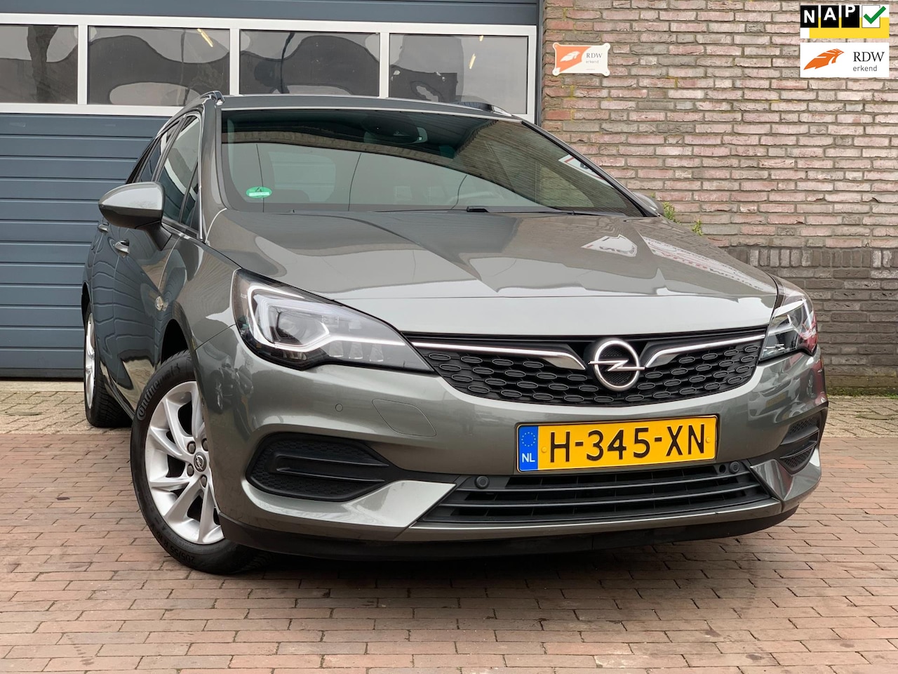 Opel Astra Sports Tourer - 1.2 Elegance|Navi|1e Eig. - AutoWereld.nl