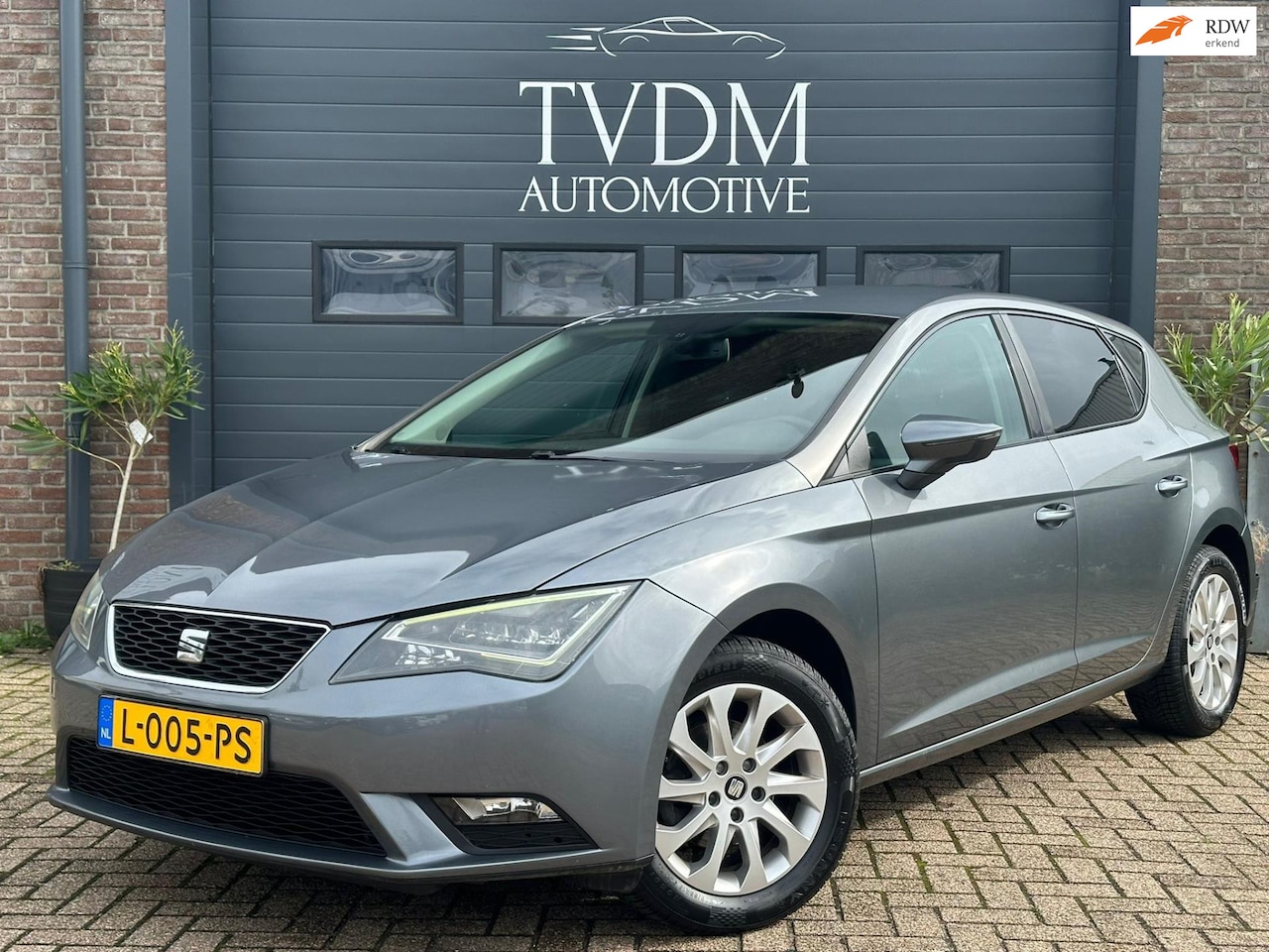 Seat Leon - 1.2 TSI Style Automaat, Airco, Bluetooth, Lichtm velgen - AutoWereld.nl