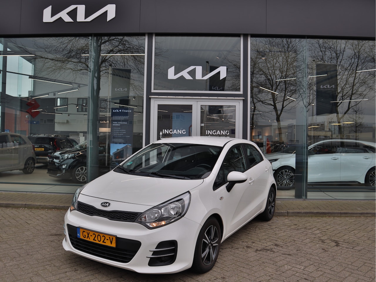 Kia Rio - 1.2 CVVT ComfortLine Airco Bluetooth+Aux+Radio-cd/mp3  ESP Cr.Control 15"LMV - AutoWereld.nl