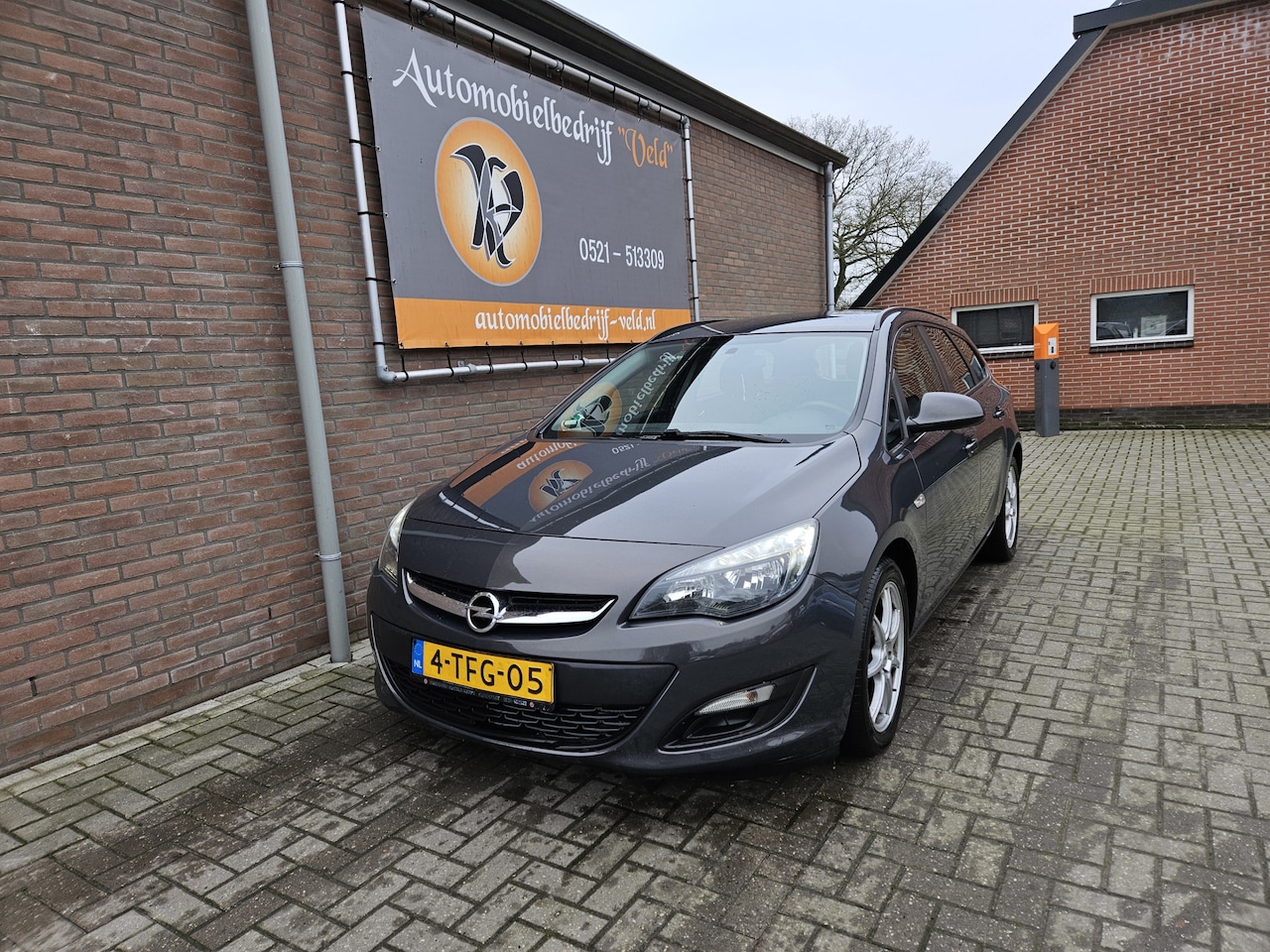 Opel Astra Sports Tourer - 1.7 CDTi Business + - AutoWereld.nl