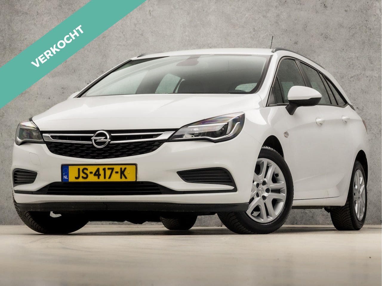 Opel Astra Sports Tourer - 1.0 Edition (APPLE CARPLAY, NAVIGATIE, CRUISE, SPORTSTOELEN, NIEUWE APK, BLUETOOTH, NIEUWS - AutoWereld.nl