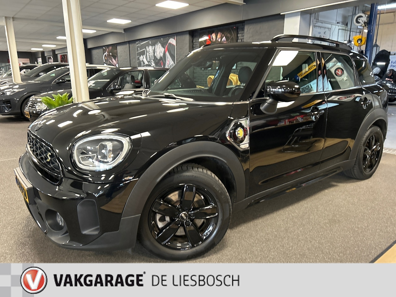 MINI Countryman - 2.0 Cooper S E ALL4 Business Edition Mini 2.0 Cooper S E ALL4 Business Edition,pano,leer,navi,stoelverw,boeken - AutoWereld.nl