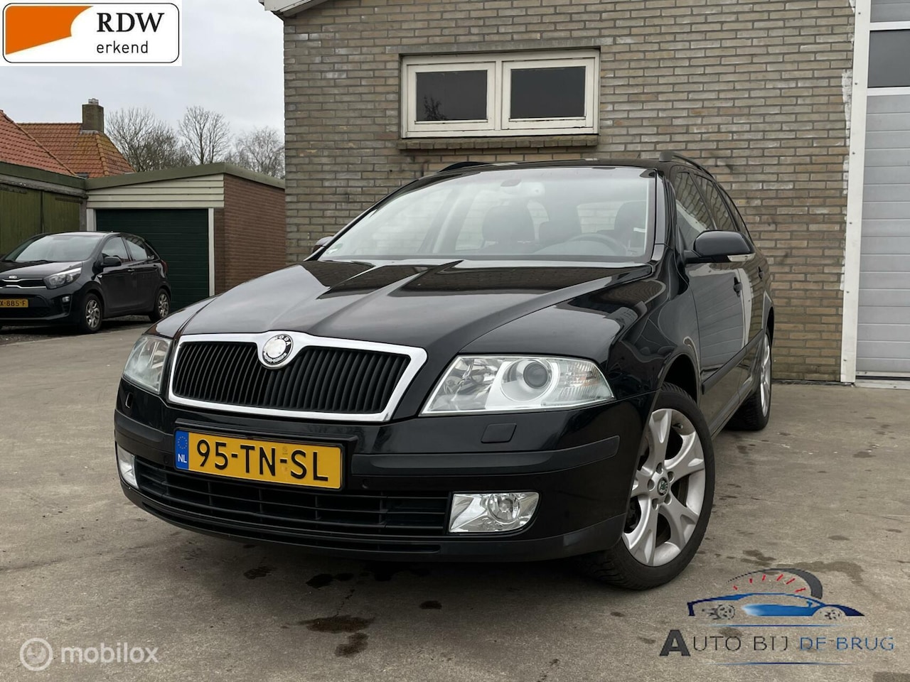 Skoda Octavia Combi - 2.0 FSI Business stoel verw Trekhaak 150PK - AutoWereld.nl