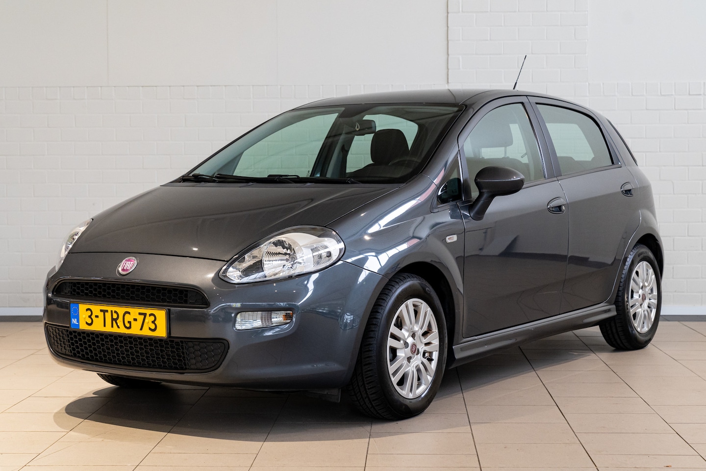 Fiat Punto Evo - 0.9 TwinAir Racing | Bluetooth | Parkeersensoren | Trekhaak | - AutoWereld.nl