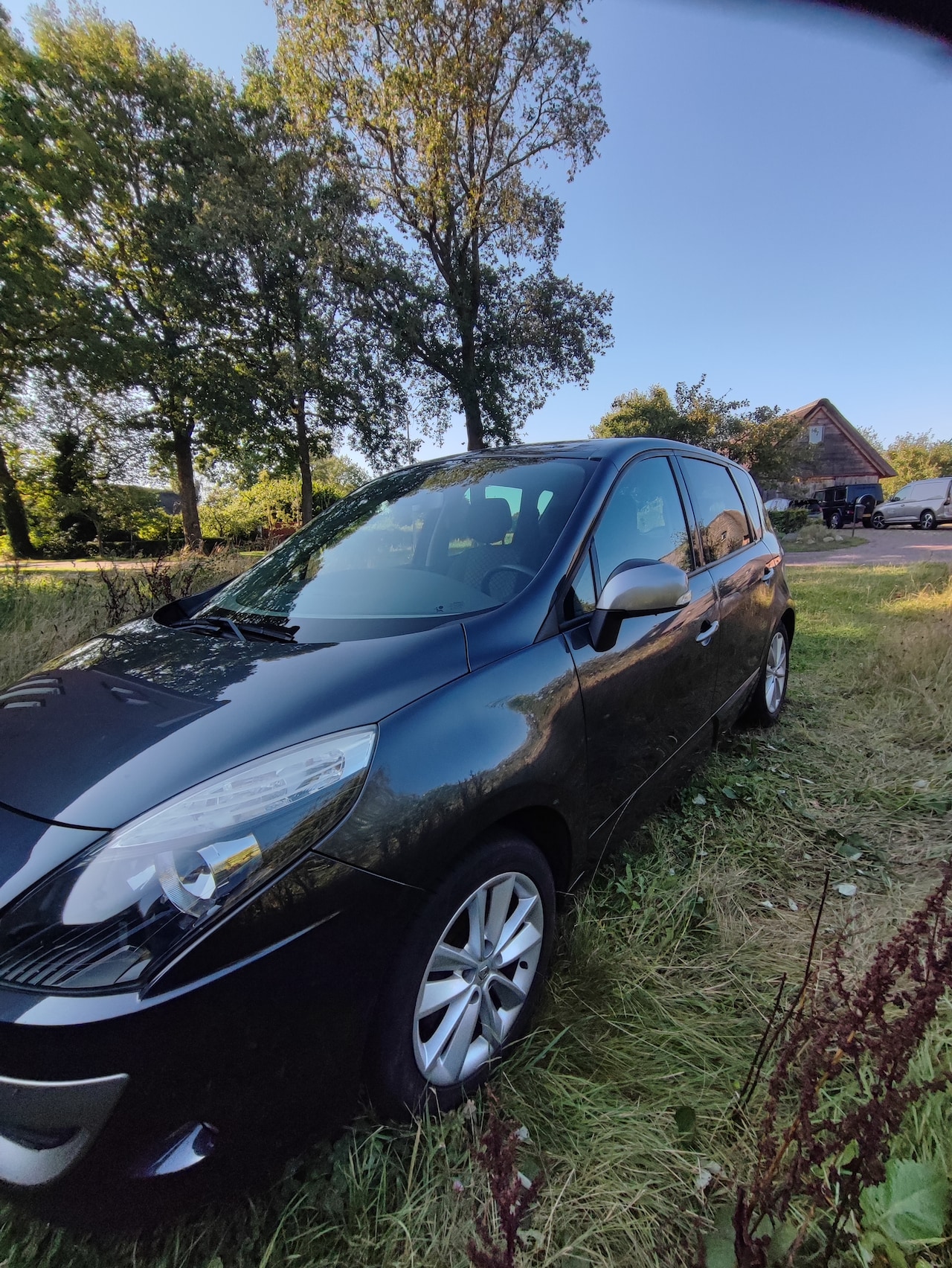 Renault Scénic - 1.6 Parisienne E85 / APK 29-03-2026! / NAP-check / Panoramadak / Cruise- Climate Control / Trekhaak / Velgen - AutoWereld.nl