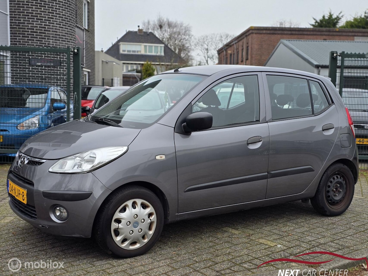 Hyundai i10 - 1.1 Active Orange Babies 1.1 Active Orange Babies - AutoWereld.nl