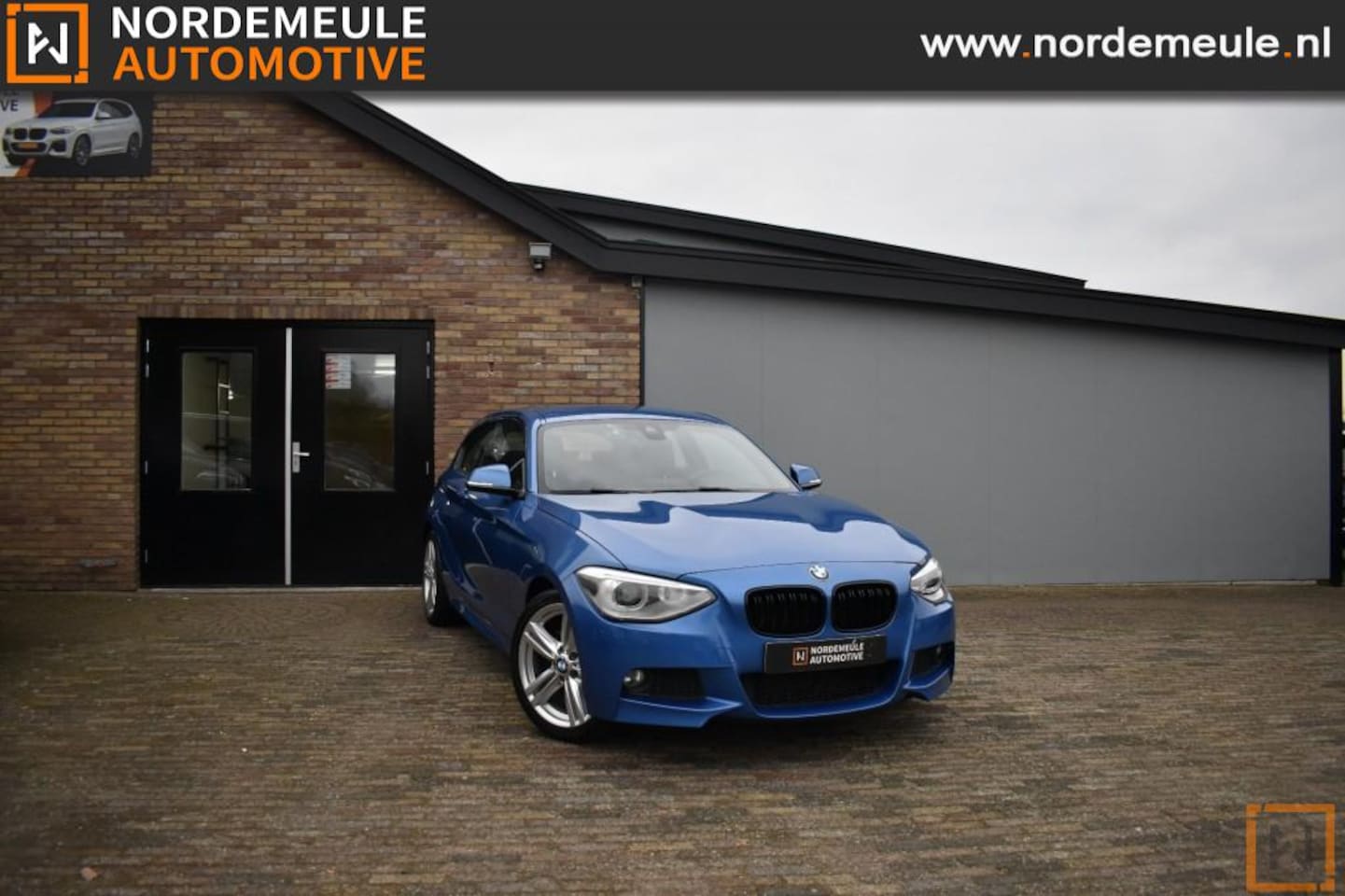 BMW 1-serie - 114i Upgrade Edition 114I UPGRADE EDITION, Xenon, Navi, Cruise, Navi - AutoWereld.nl