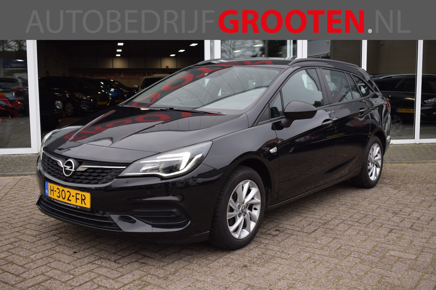 Opel Astra Sports Tourer - 1.2 Edition//Sportstoelen//Navi//24.495km!! - AutoWereld.nl