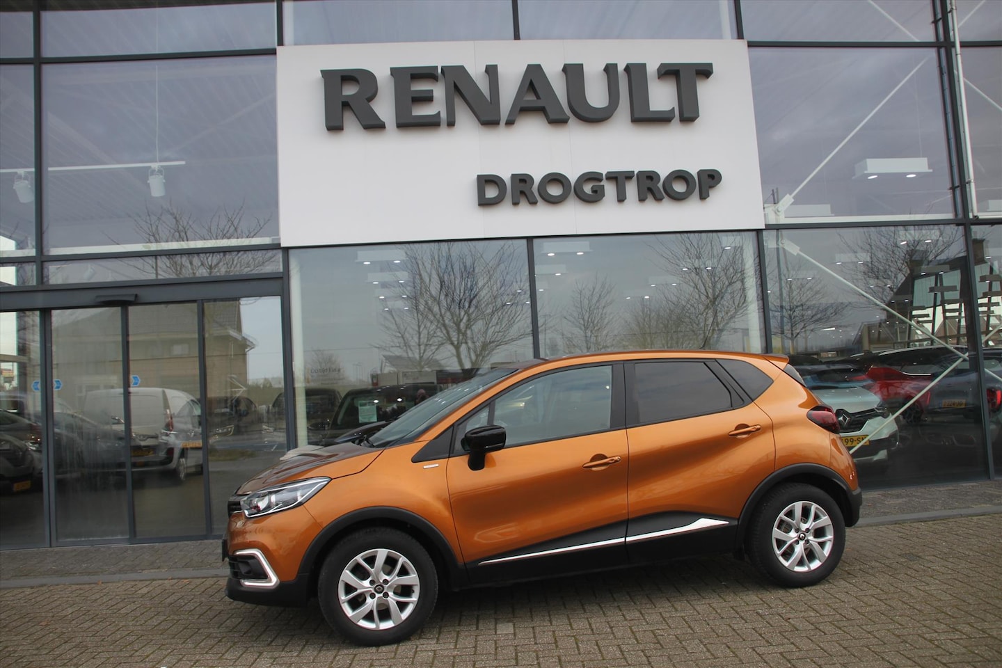 Renault Captur - 90PK-LIMITED-34DKM-AIRCO-NAVI-CRUISE-LMV-PDC- - AutoWereld.nl